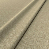 Fabric swatch of a cream woven fabric for upholstery