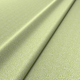 Fabric swatch of a green woven fabric for upholstery