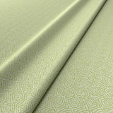 Fabric swatch of a green woven fabric for upholstery