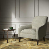 Armchair upholstered in a blue woven fabric