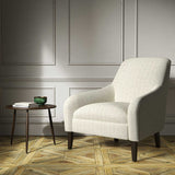 Armchair upholstered in a grey woven fabric