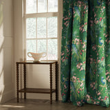 Curtain in a lively, tropical floral and bird linen fabric