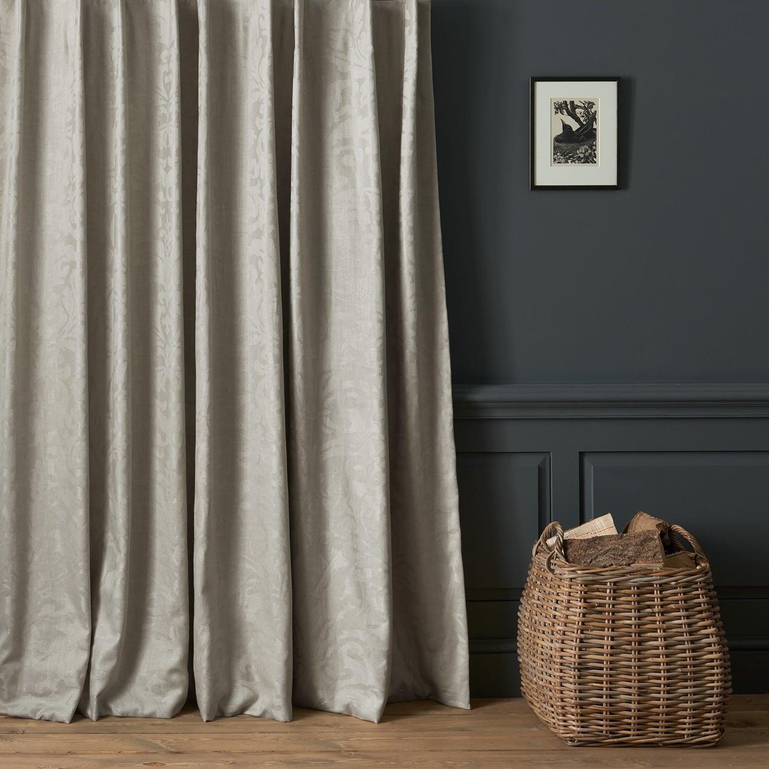 Curtains in a contemporary damask fabric in a neutral colour.