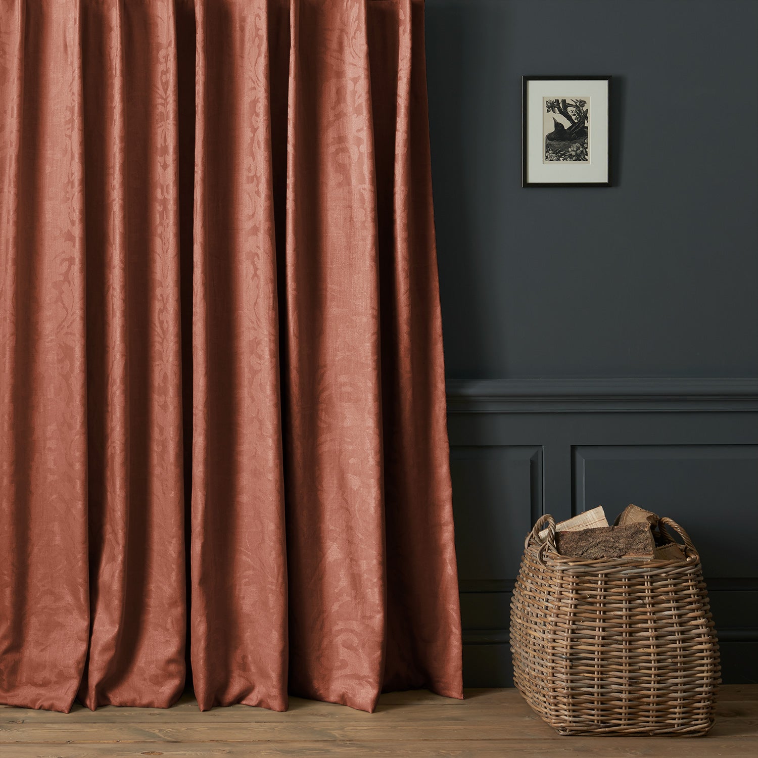 Curtains in a contemporary damask fabric in a terracotta colour.