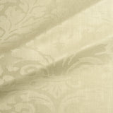 Fabric swatch of a contemporary damask fabric in a light green colour for upholstery and curtains.