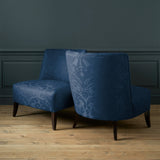 Armchairs in a contemporary damask fabric with dark blue colours.