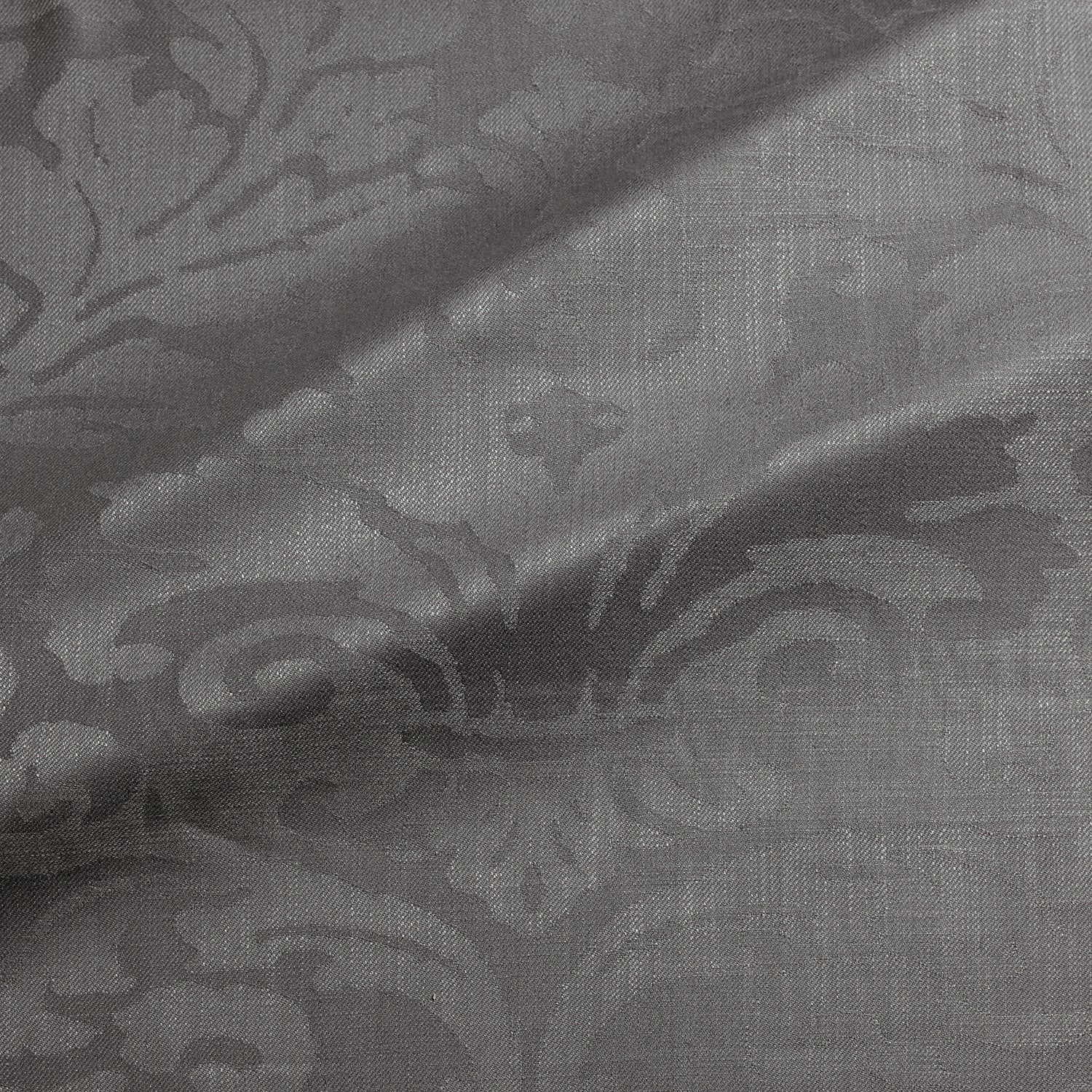 Fabric swatch of a contemporary damask fabric in a dark grey colour for upholstery and curtains.