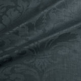 Fabric swatch of a contemporary damask fabric in dark grey colours for upholstery and curtains.