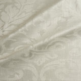 Fabric swatch of a contemporary damask fabric in a neutral colour for upholstery and curtains.