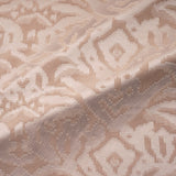 Fabric swatch of a soft blush pink fabric with jacquard design for curtain use