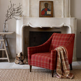 Chair upholstered in a red Scottish wool plaid check fabric