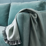 Blue eco velvet upholstery fabric on a sofa