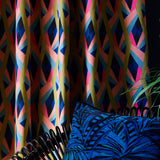 Velvet curtains in a bright coloured geometric fabric