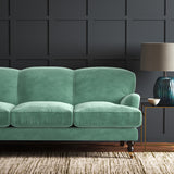 Blue eco velvet upholstery fabric on a sofa