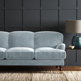 Blue eco velvet upholstery fabric on a sofa
