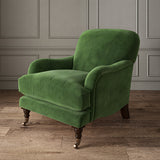 Green eco velvet upholstery fabric on an armchair