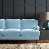 Blue eco velvet upholstery fabric on a sofa
