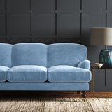 Blue eco velvet upholstery fabric on a sofa