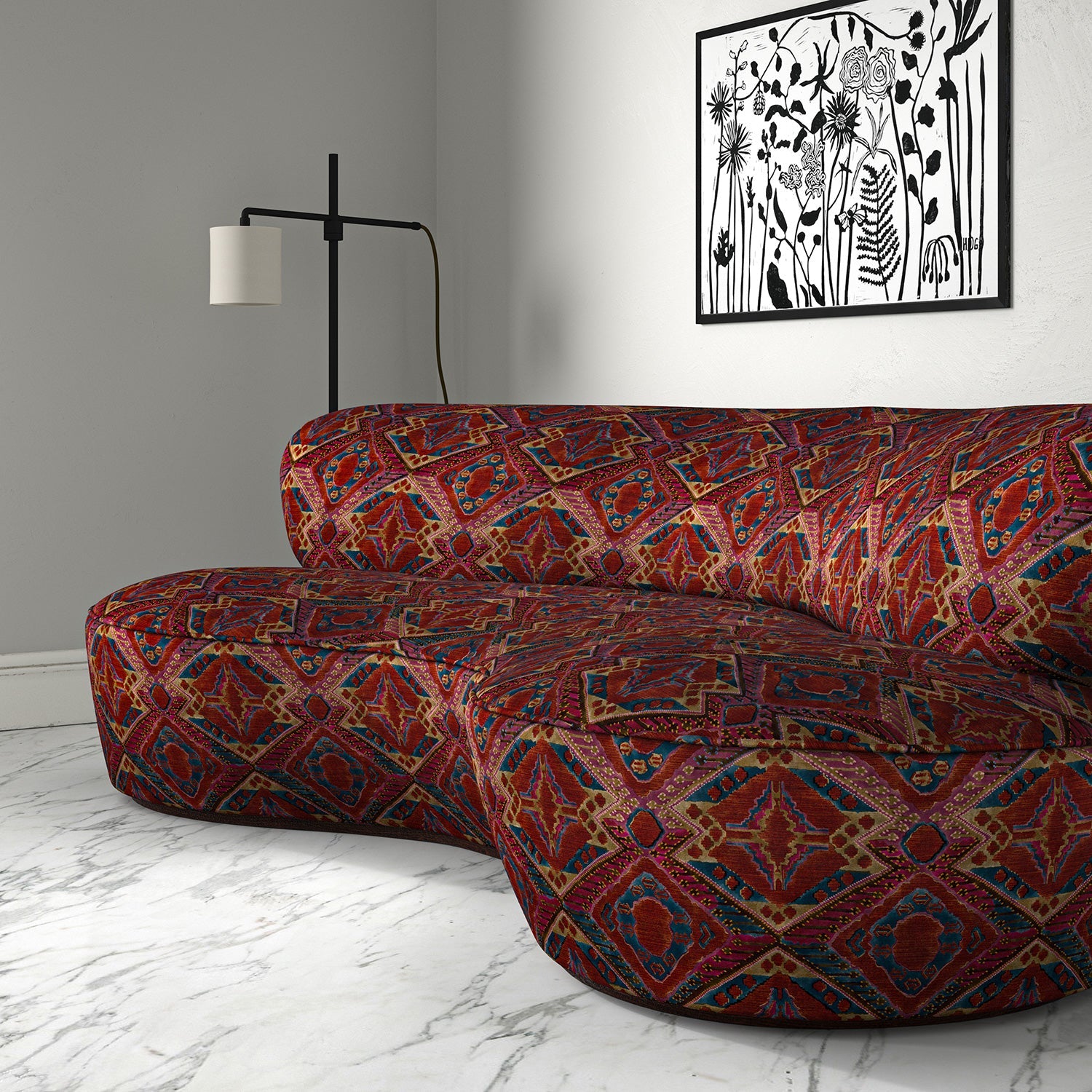 Sofa in printed velvet fabric – an exuberant carpet design in red colours.