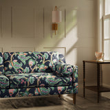 Sofa upholstered in a linen fabric with a floral vine design