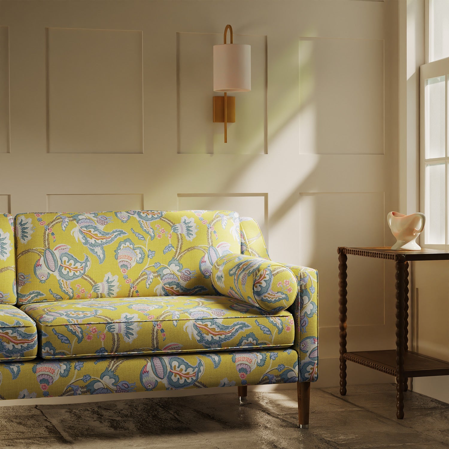 Sofa upholstered in a linen fabric with a floral vine design