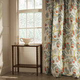 Curtain in a linen fabric with floral vine design