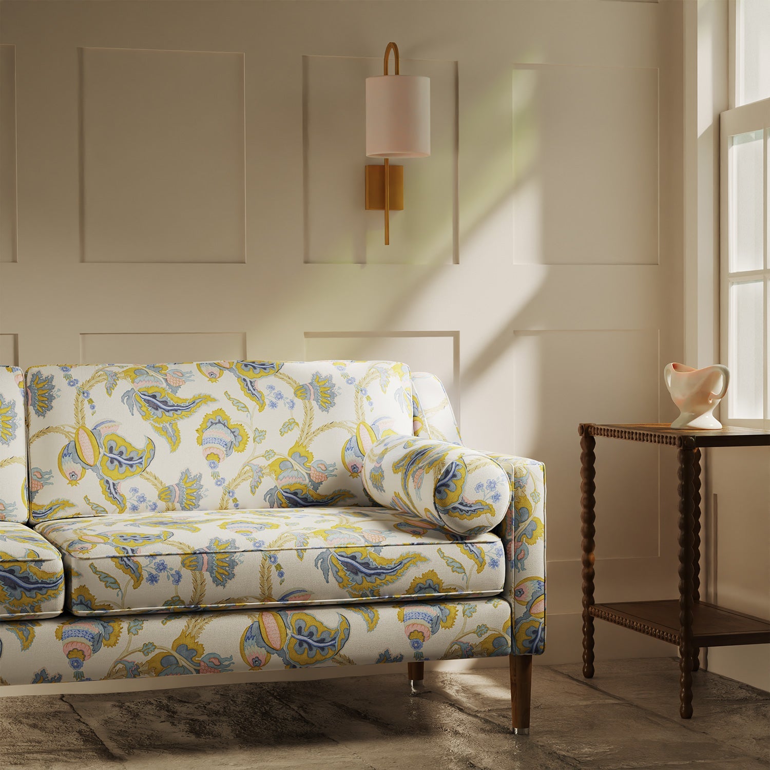 Sofa upholstered in a linen fabric with a floral vine design