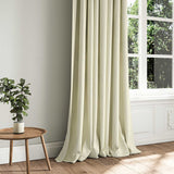 A cream woven fabric shown as a curtain.