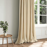 A cream woven fabric shown as a curtain.