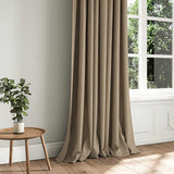 A brown woven fabric shown as a curtain.