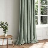 A blue woven fabric shown as a curtain.