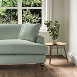 A blue, stain resistant woven fabric on an armchair.