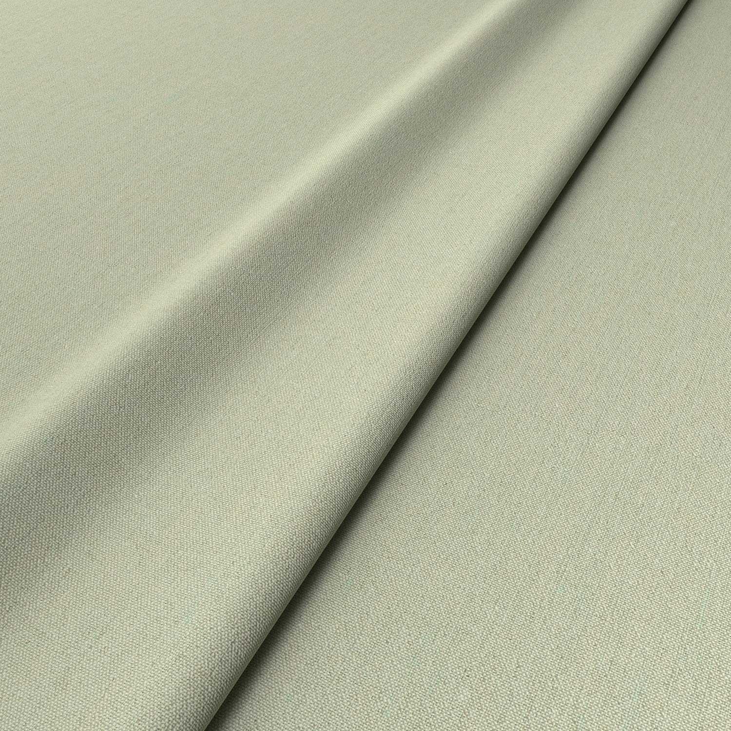 Sample of a green woven fabric