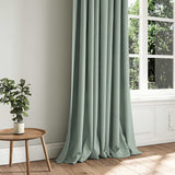 A blue woven fabric shown as a curtain.