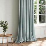 A blue woven fabric shown as a curtain.