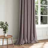 A purple woven fabric shown as a curtain.