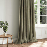 A brown woven fabric shown as a curtain.