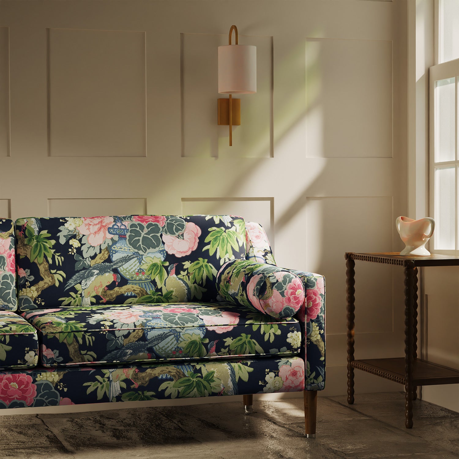 Sofa upholstered in a linen fabric with a floral and bird design
