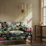 Sofa upholstered in a linen fabric with a floral and bird design