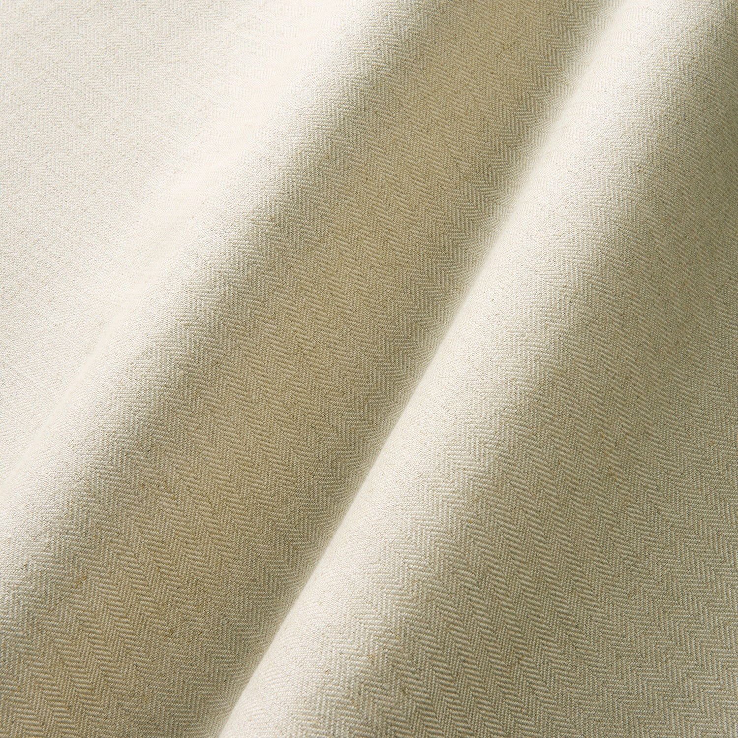 Small-scale herringbone is woven with linen and viscose for upholstery.