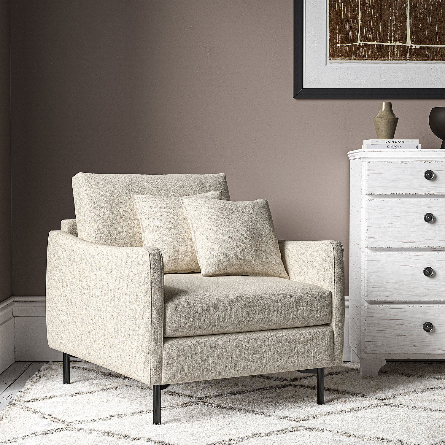 Chair covered in a boucle fabric in Almond