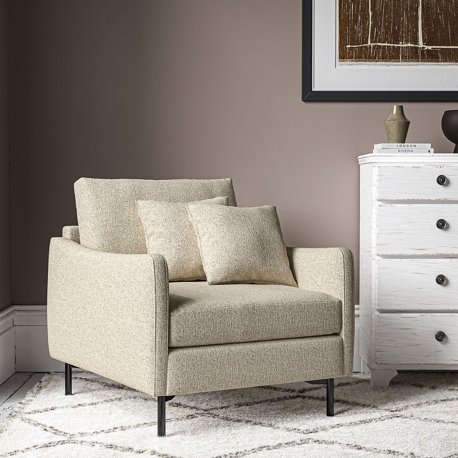 Chair covered in a boucle fabric in Pumice