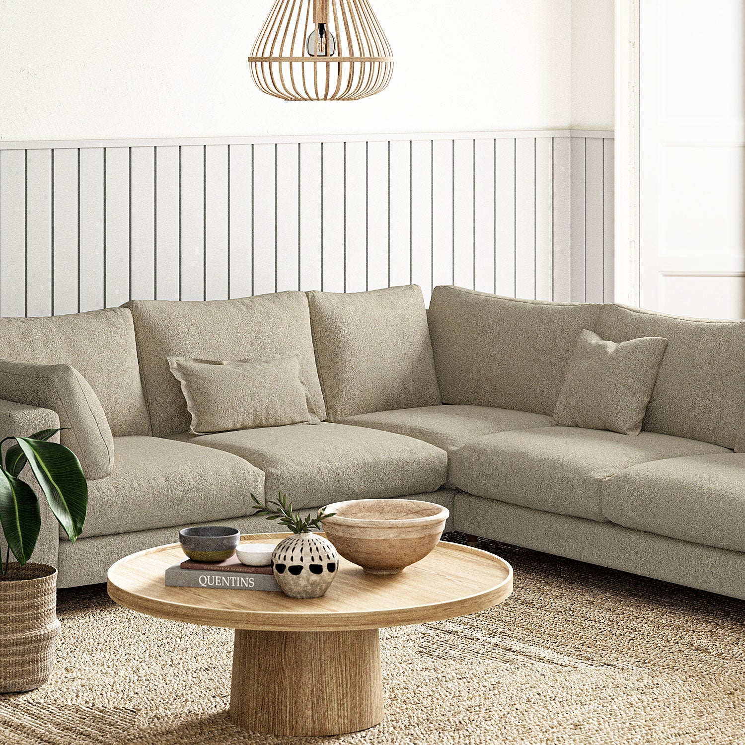 Sofa covered in a boucle fabric in Fawn
