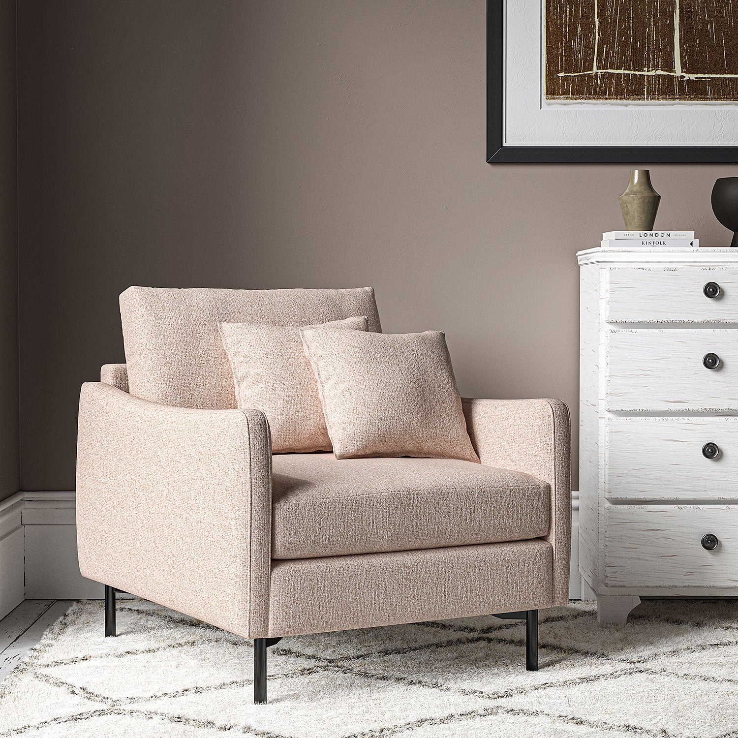 Chair covered in a boucle fabric in Pale Pink