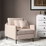 Chair covered in a boucle fabric in Pale Pink