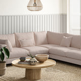 Sofa covered in a boucle fabric in Pale Pink