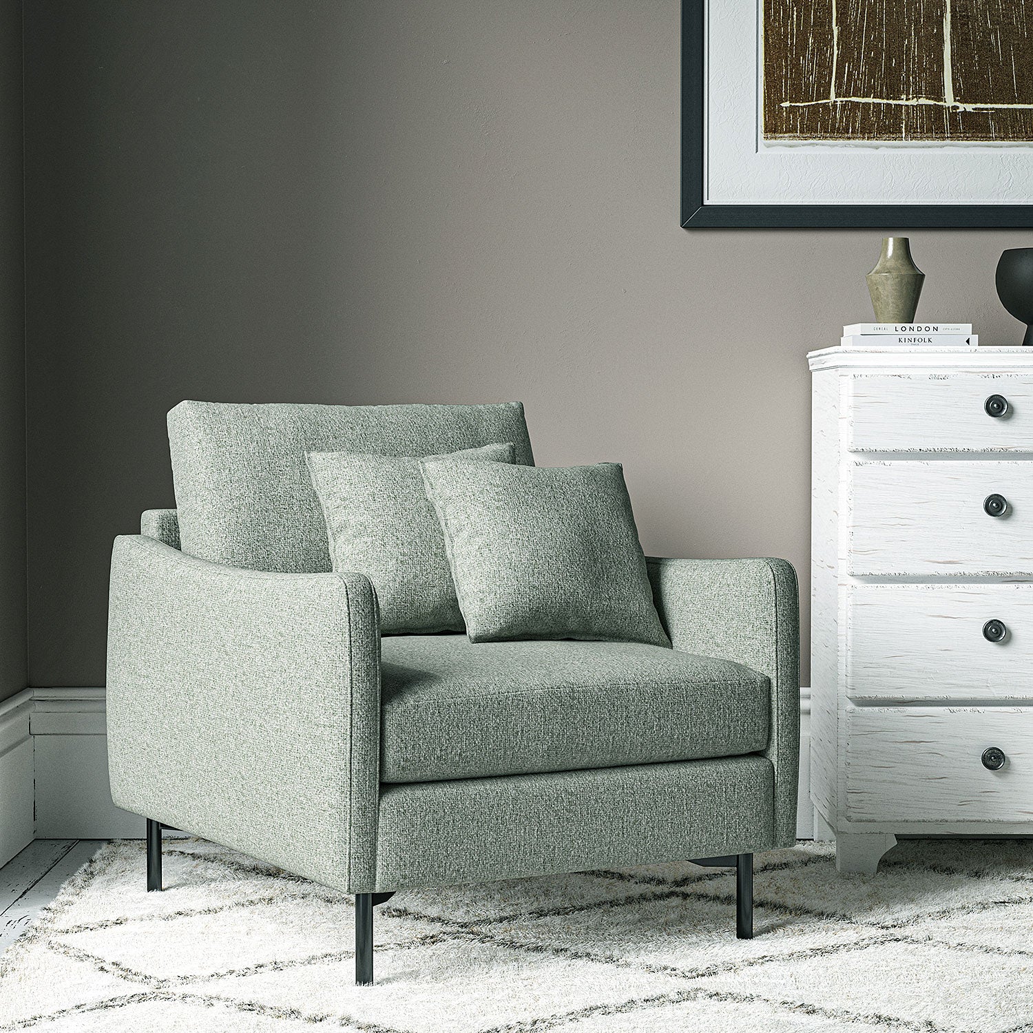Chair covered in a boucle fabric in Mineral