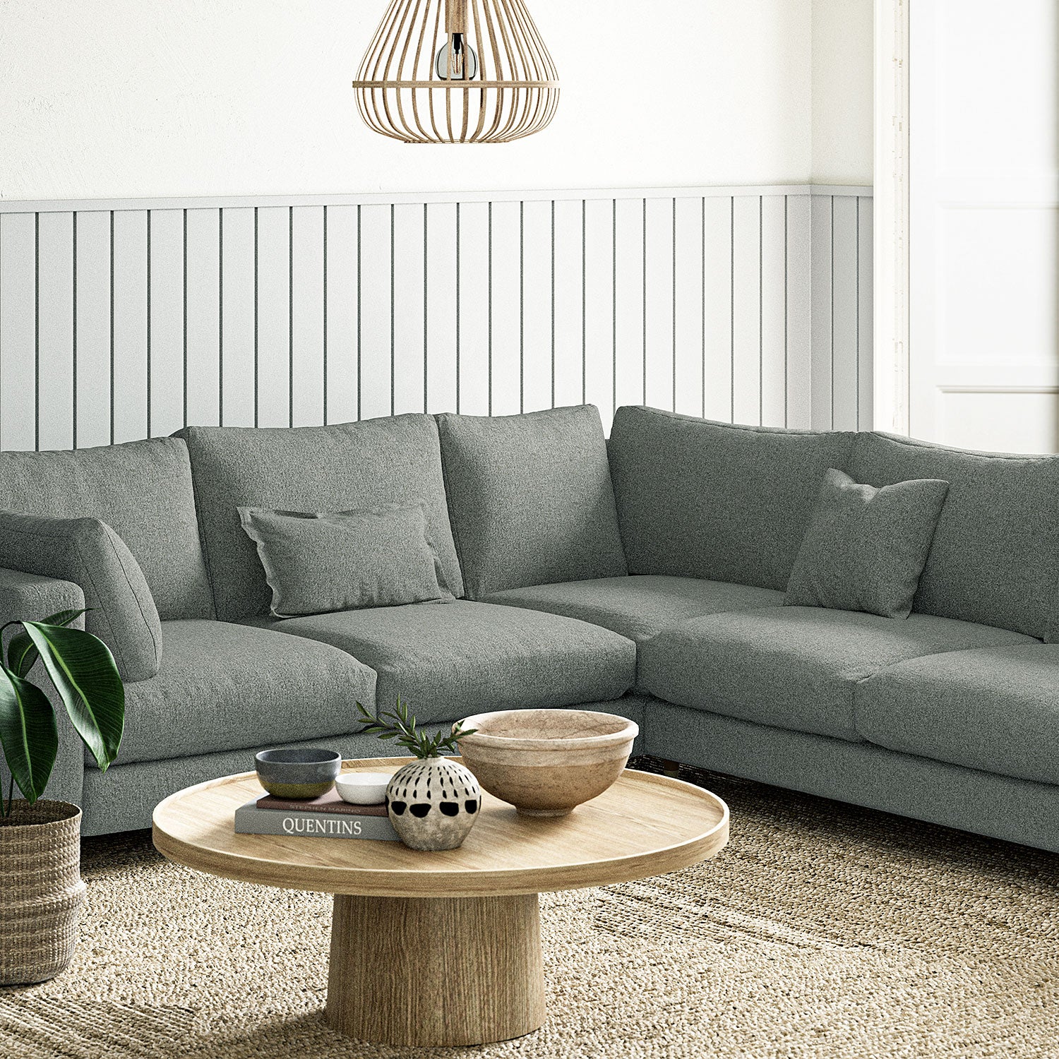 Sofa covered in a boucle fabric in Fossil