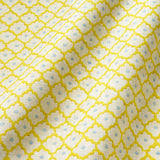 Printed linen fabric sample - a classic trellis design in blue, yellow, and cream