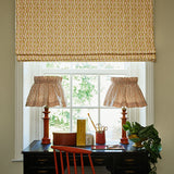 Printed linen fabric - a geometric design in pink, yellow and blue – on a lampshade & blind